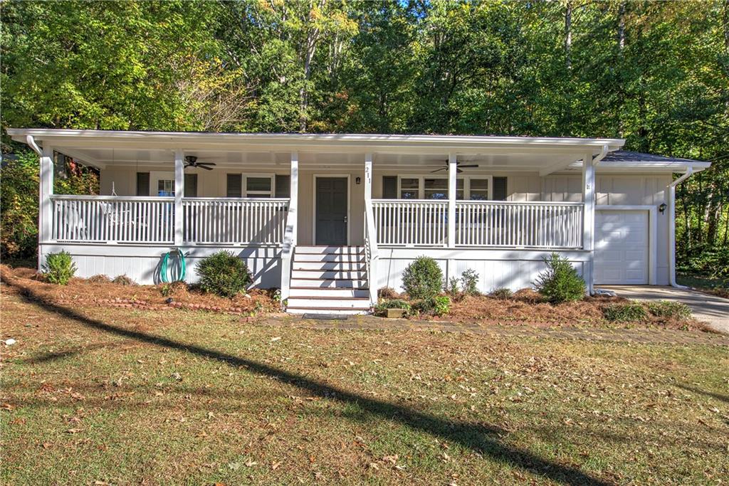 211 Alfred Avenue Southeast Rome, GA 30161 - Photo 1 of 1 front view of a house with a small yard