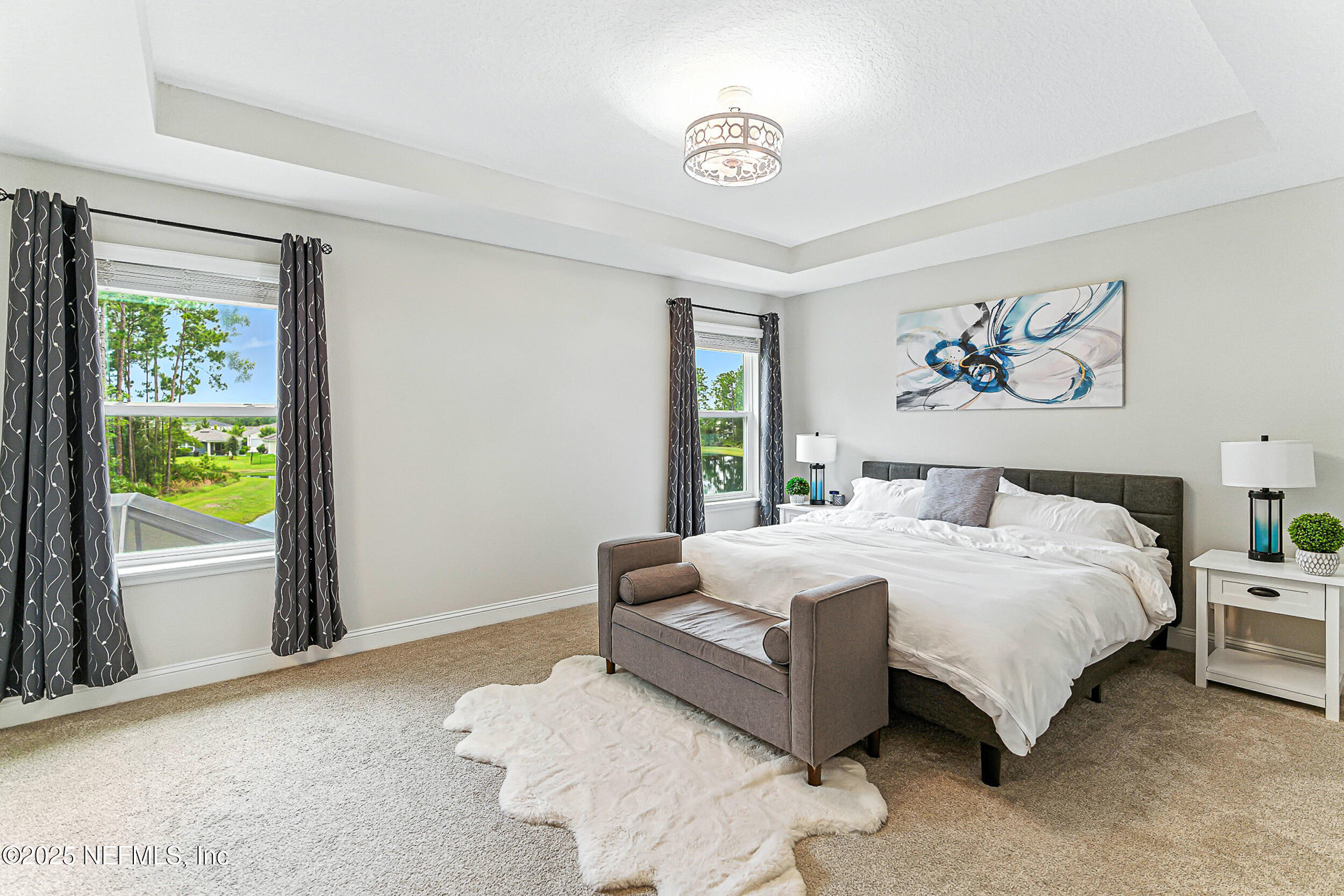 105 Meadow Creek Drive St. Johns, FL 32259 - Photo 16 of 37 a bedroom with bed and a window