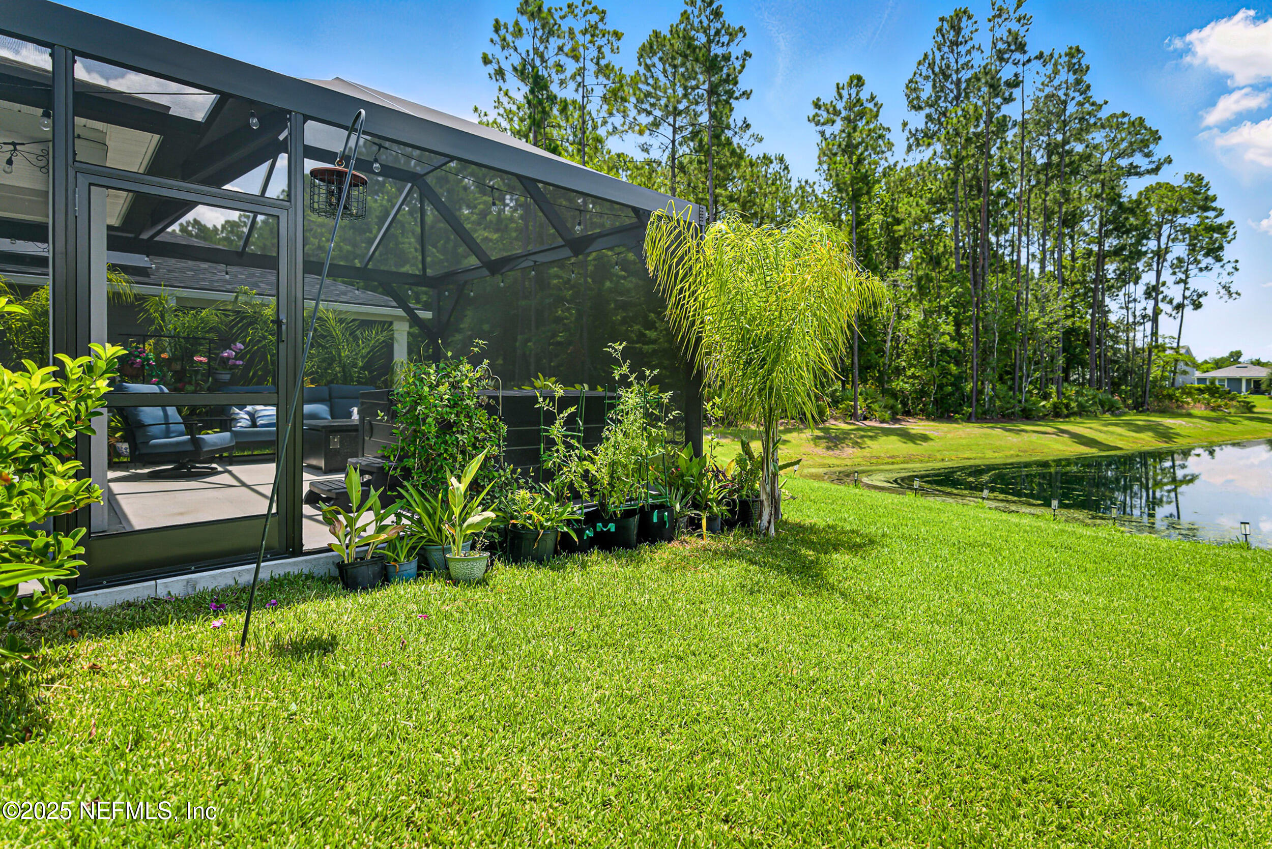105 Meadow Creek Drive St. Johns, FL 32259 - Photo 32 of 37 a view of a yard in front of house