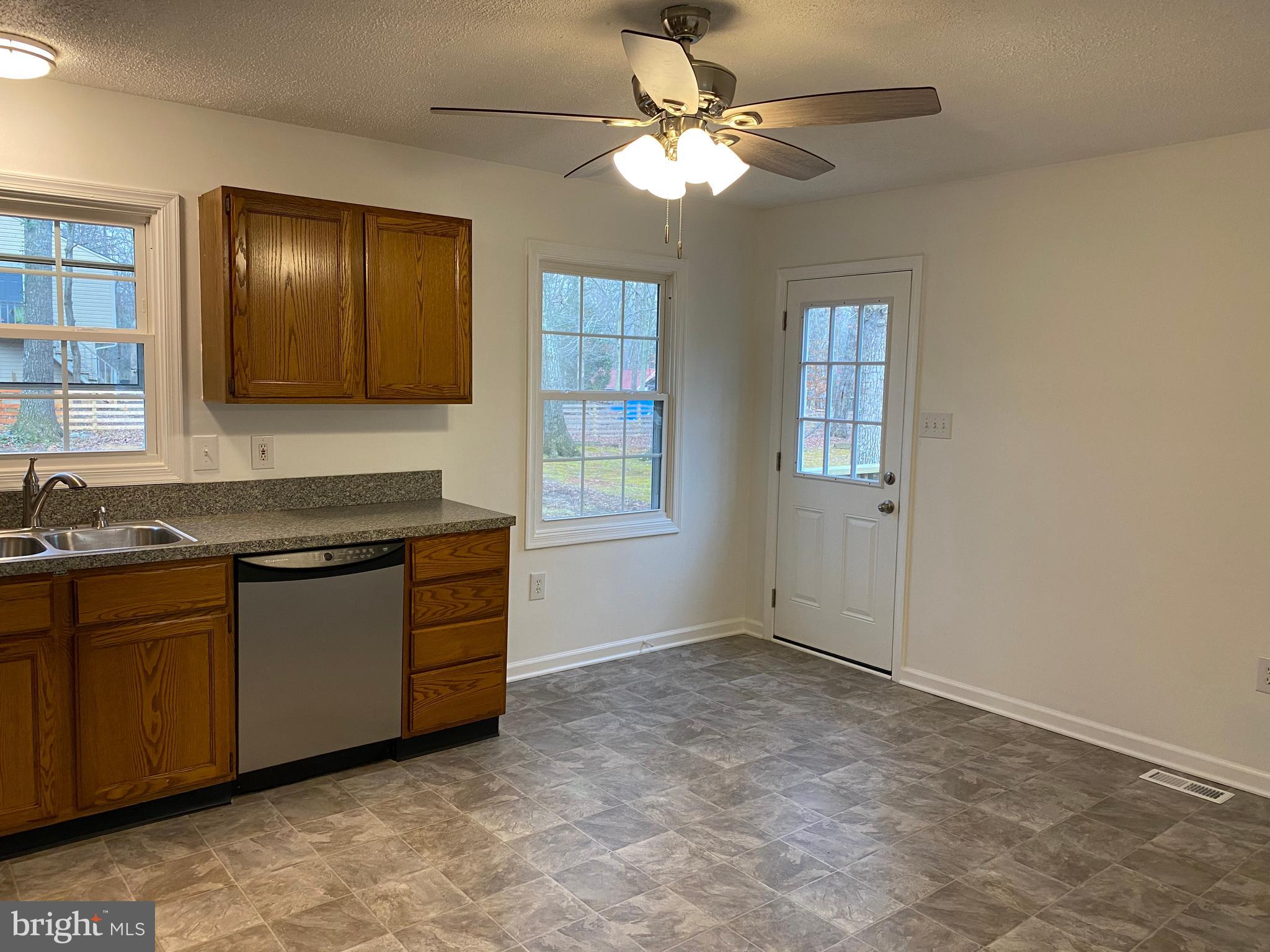 604 Tacketts Mill Road Stafford, VA 22556 - Photo 17 of 41 Kitchen with a side entrance