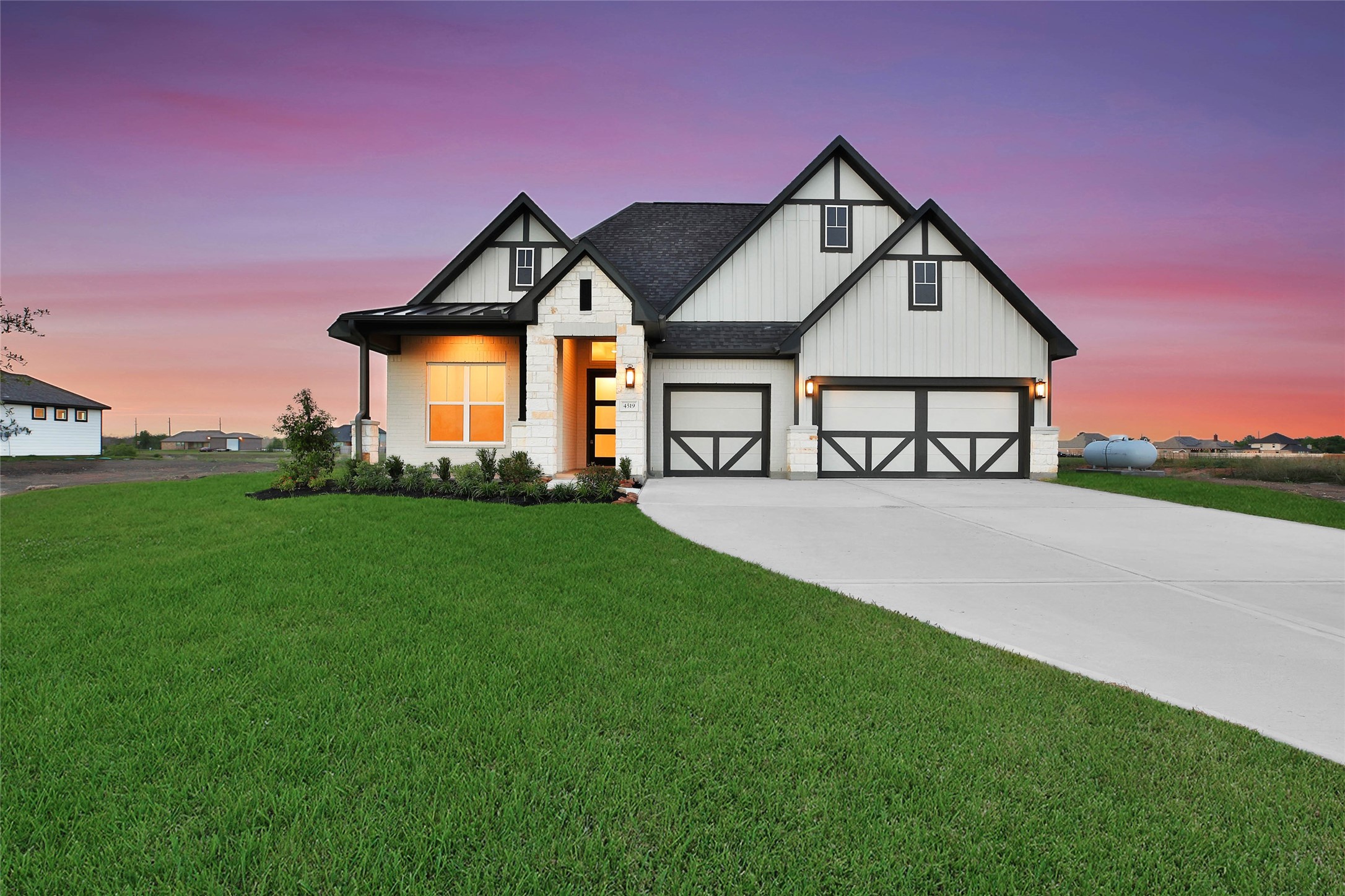 4519 Magnolia Bend Drive Rosharon, TX 77583 - Photo 1 of 48 a front view of a house with garden