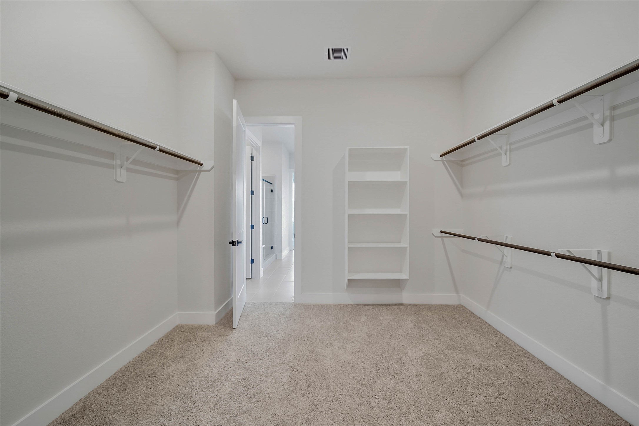 4519 Magnolia Bend Drive Rosharon, TX 77583 - Photo 21 of 48 a view of an empty walk in closet