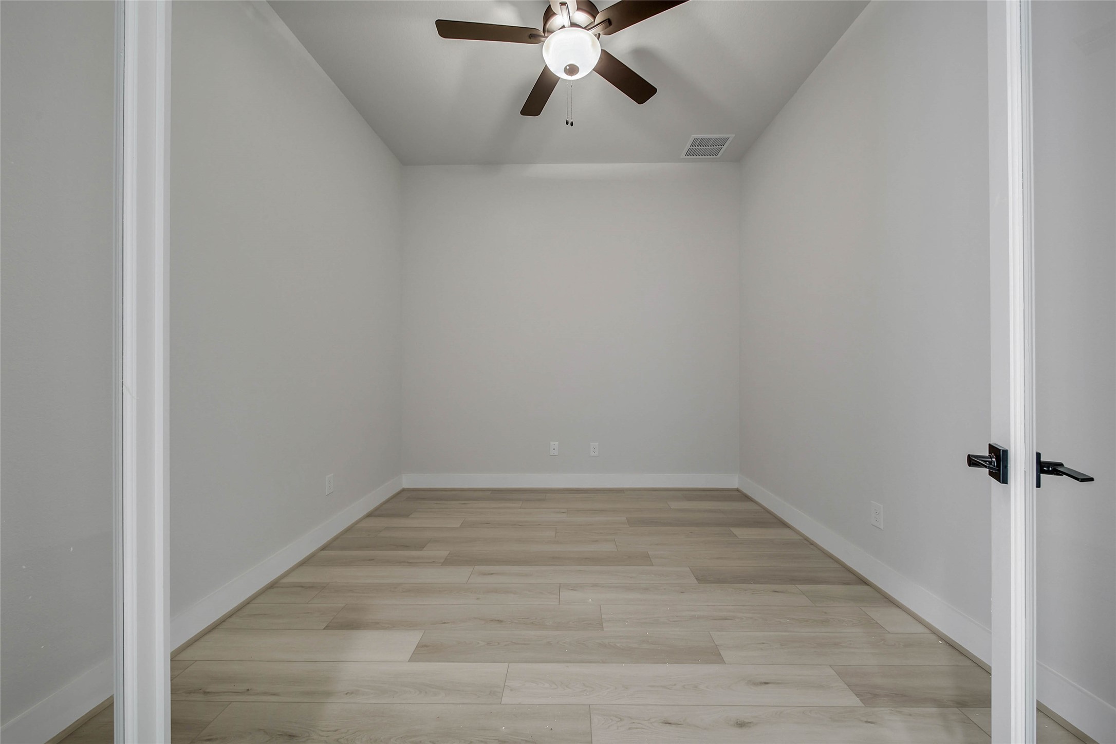 4519 Magnolia Bend Drive Rosharon, TX 77583 - Photo 23 of 48 wooden floor in an empty room