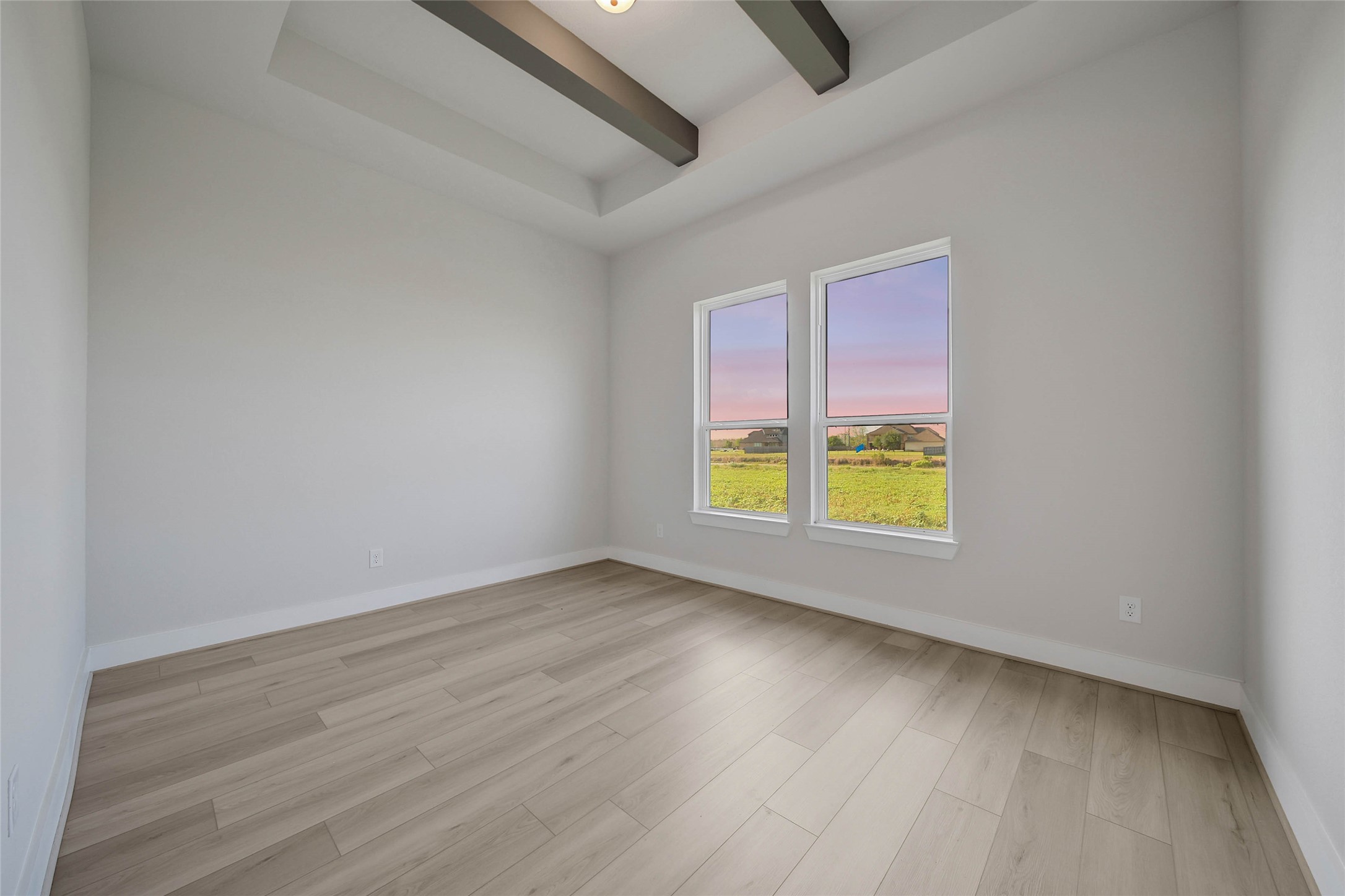 4519 Magnolia Bend Drive Rosharon, TX 77583 - Photo 27 of 48 an empty room with a window and wooden floor