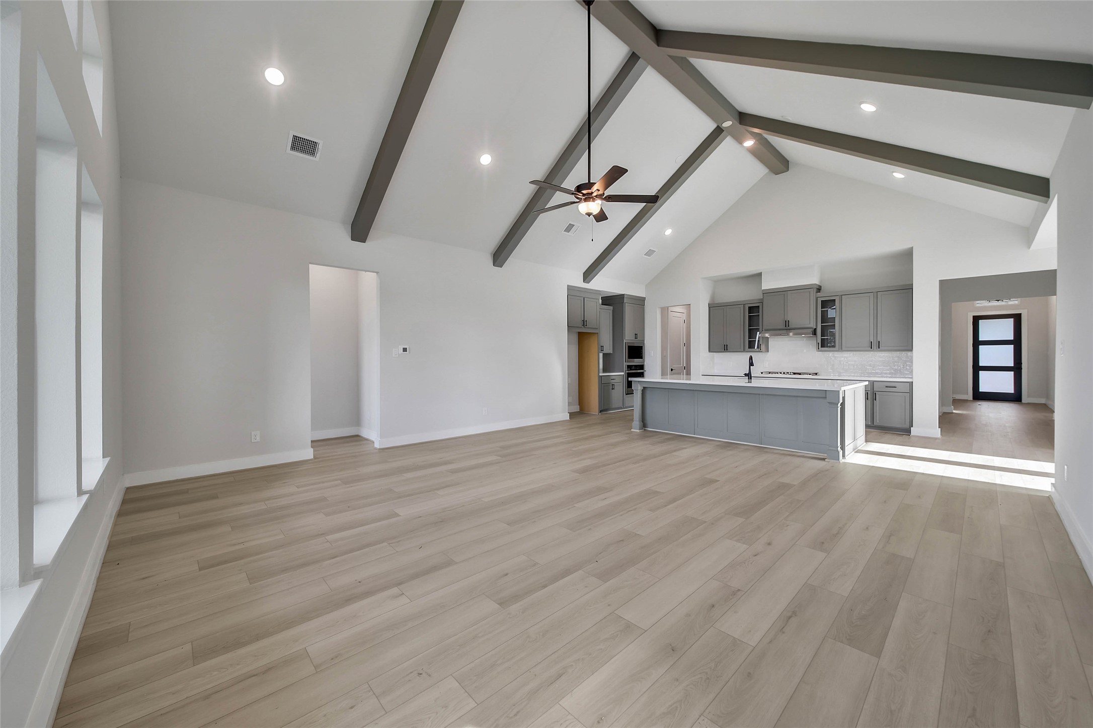 4519 Magnolia Bend Drive Rosharon, TX 77583 - Photo 4 of 48 a view of kitchen and hall with wooden floor