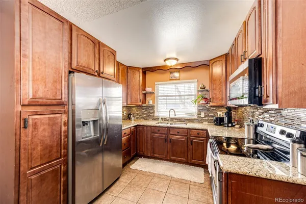 $490,800 | 20571 East Coolidge Place, Aurora, CO 80011