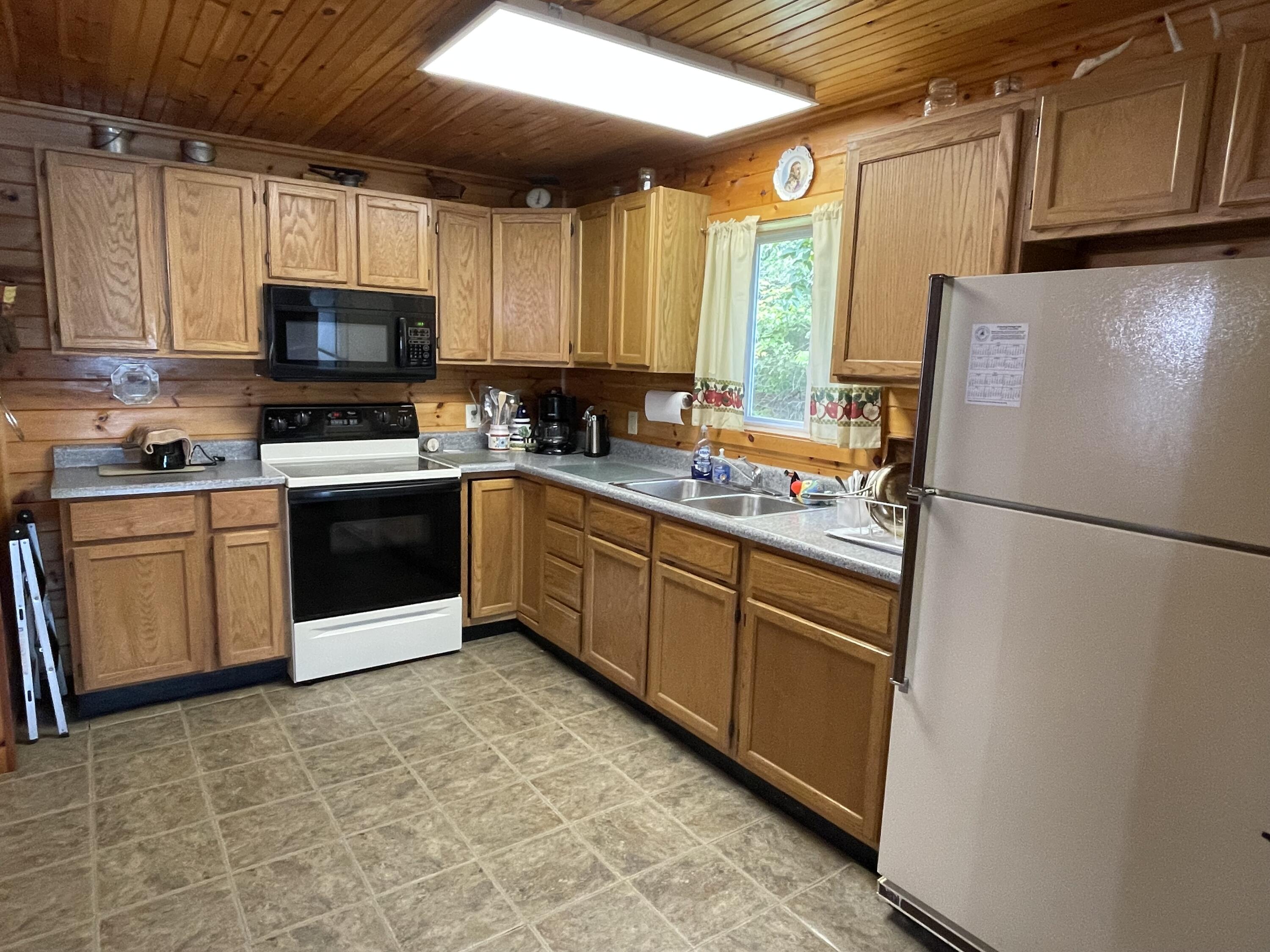 794 W Road Portage, ME 04768 - Photo 15 of 41 IMG_7009
