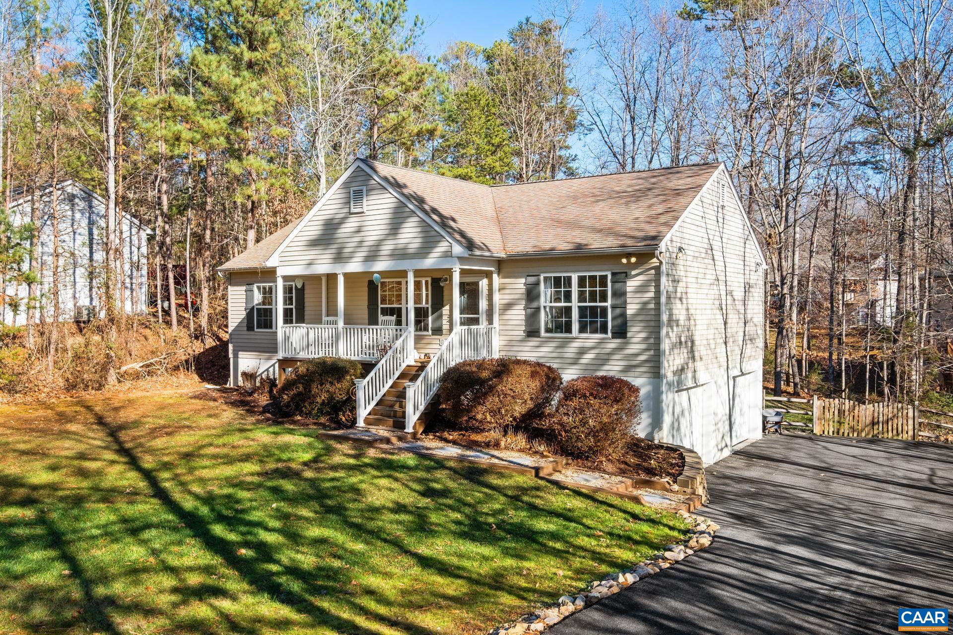 3 Powhatan Road Palmyra, VA 22963 - Photo 2 of 42 a view of a house with backyard sitting area and garden