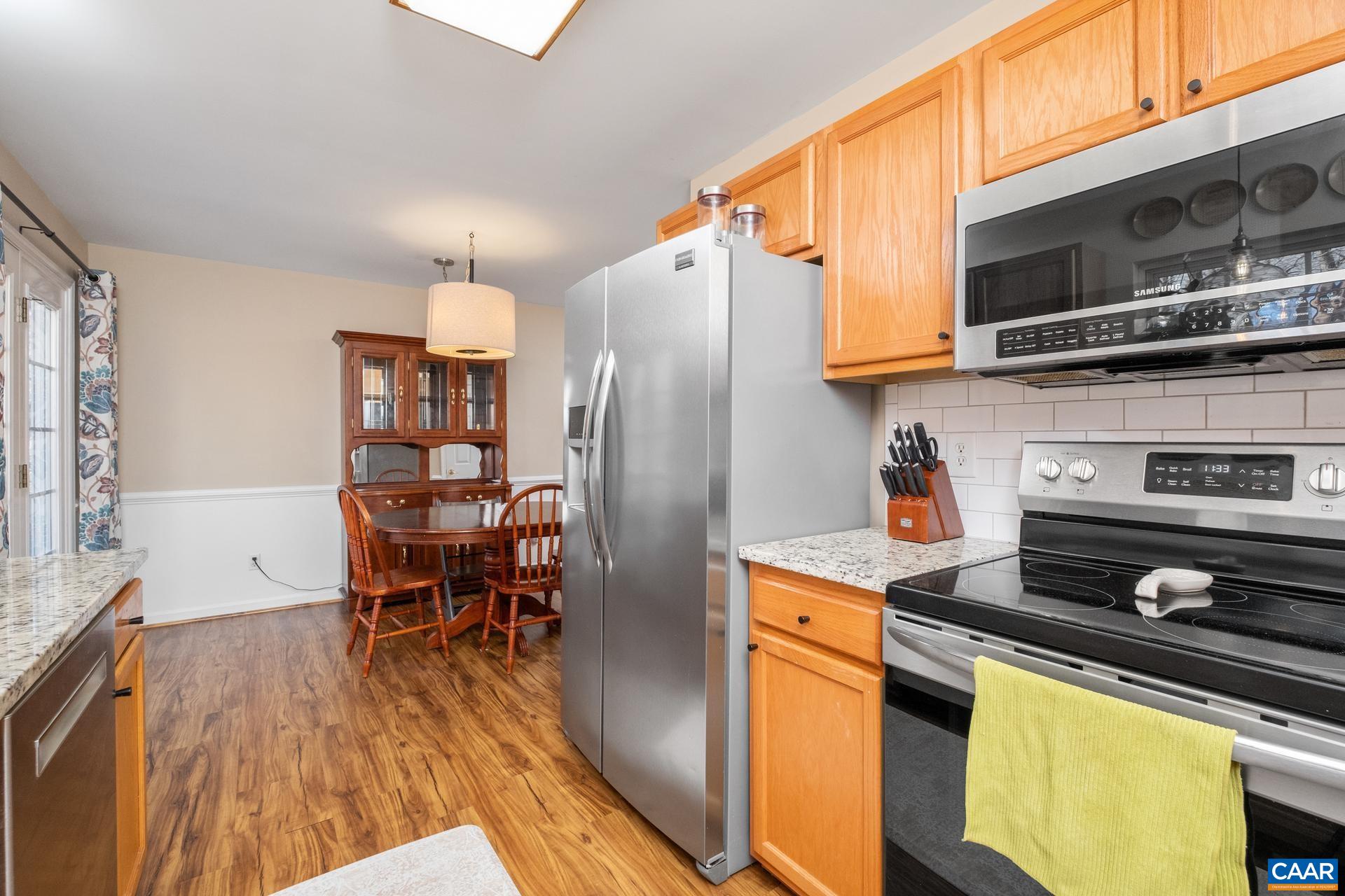 3 Powhatan Road Palmyra, VA 22963 - Photo 25 of 42 a kitchen with stainless steel appliances a stove a sink and a refrigerator