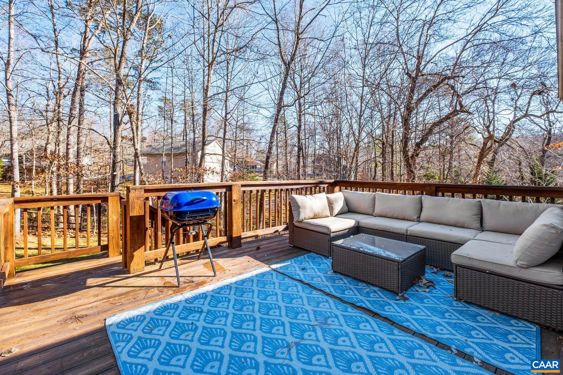 3 Powhatan Road Palmyra, VA 22963 - Photo 28 of 42 a roof deck with couches and wooden floor