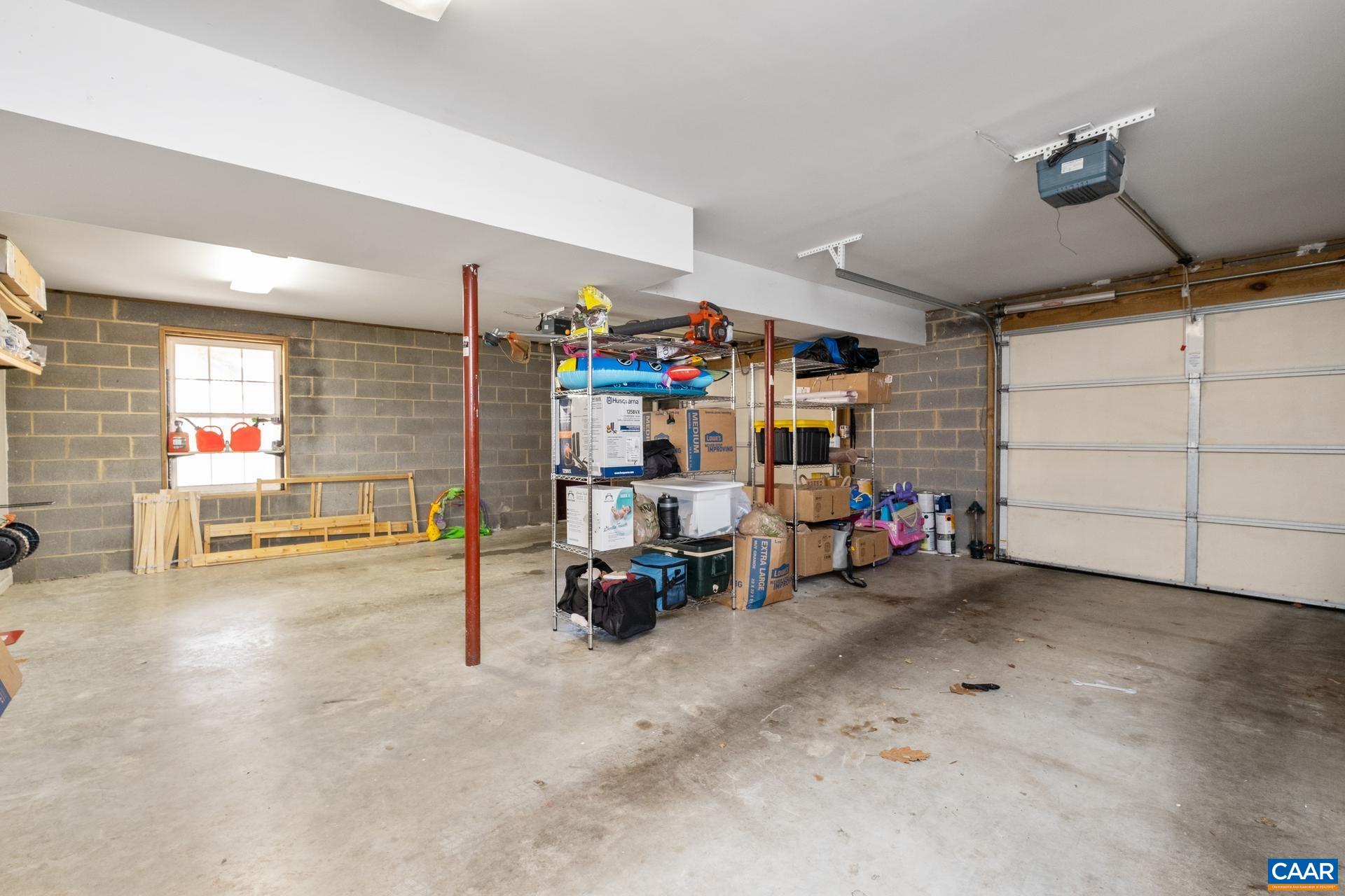 3 Powhatan Road Palmyra, VA 22963 - Photo 35 of 42 a view of a garage with rack and bicycle