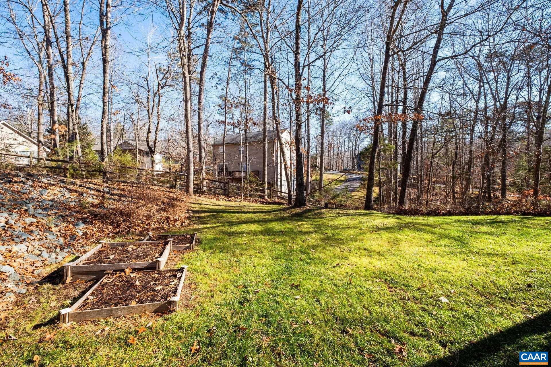 3 Powhatan Road Palmyra, VA 22963 - Photo 40 of 42 a view of swimming pool with large trees