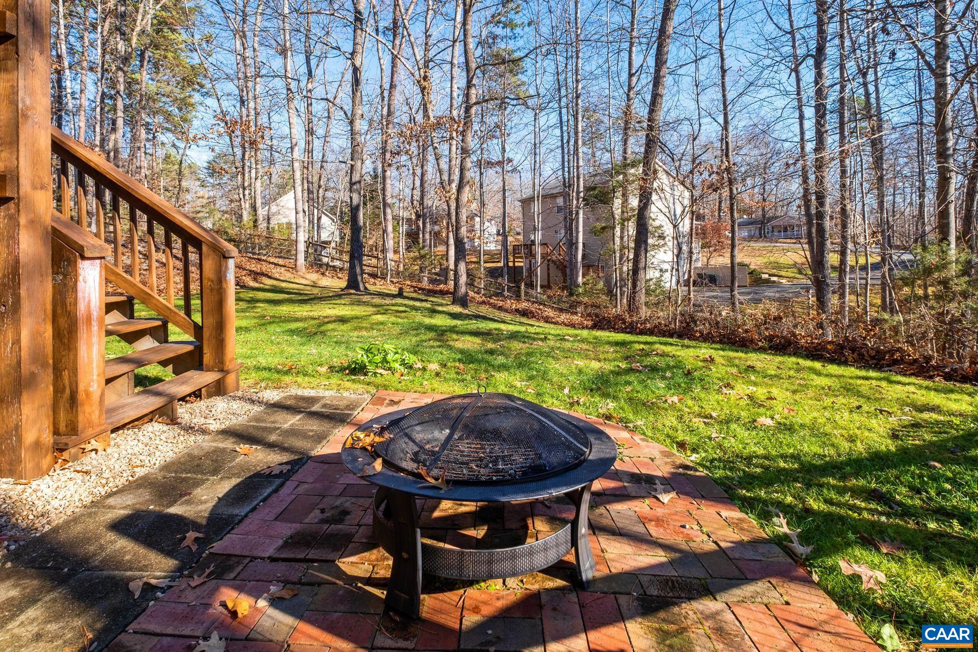 3 Powhatan Road Palmyra, VA 22963 - Photo 41 of 42 a view of backyard with swimming pool and sitting area