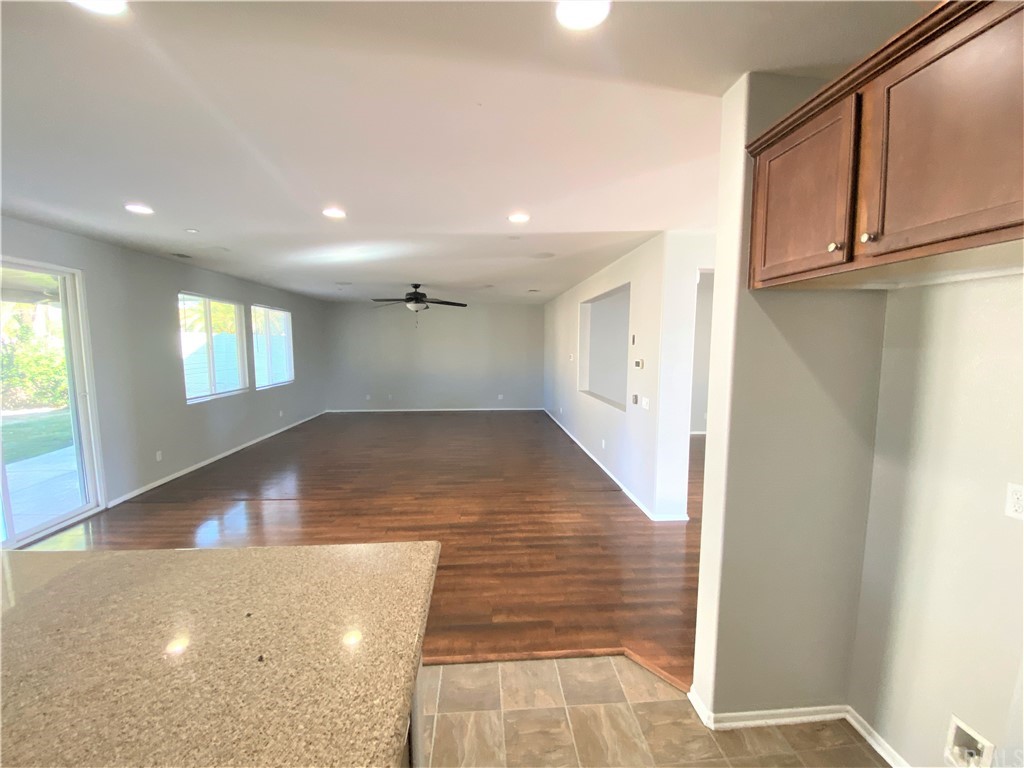 35123 Hulihee Street Winchester, CA 92596 - Photo 8 of 36 a view of a hallway with an empty room
