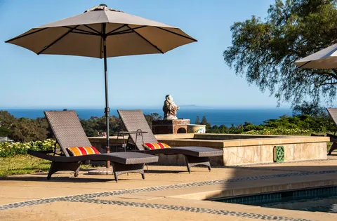 a view of a ocean from a roof deck