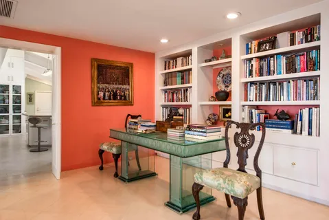 a view of a workspace with furniture