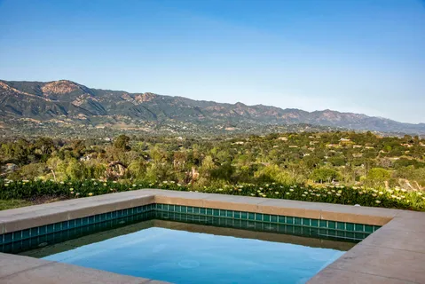 a view of balcony with mountain view