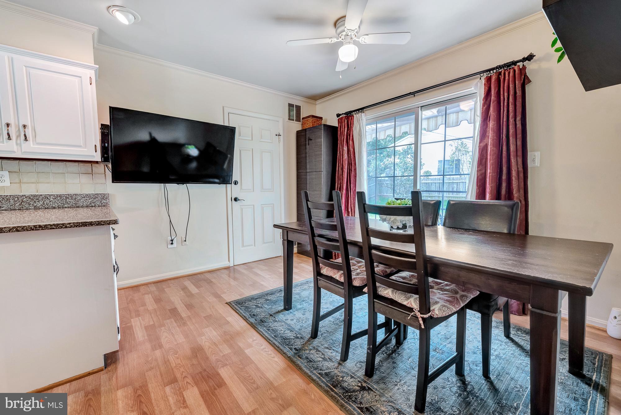 17310 Fletchall Road Poolesville, MD 20837 - Photo 19 of 30 Table space and access to the back patio