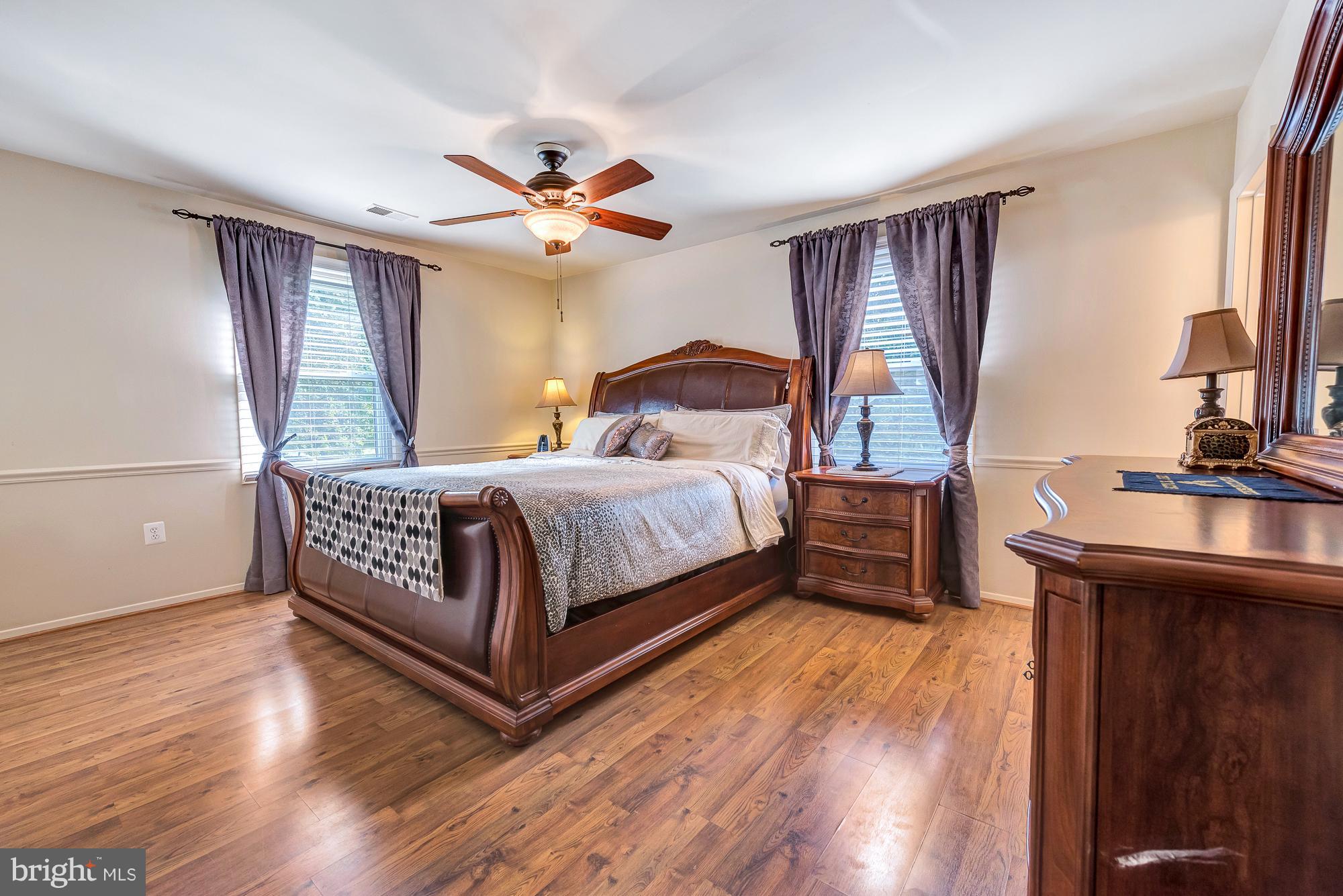 17310 Fletchall Road Poolesville, MD 20837 - Photo 22 of 30 That's a king master bed set with end tables.....