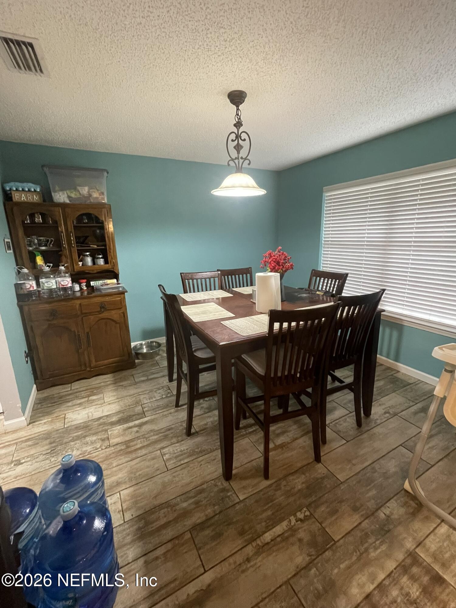 2946 Longleaf Ranch Circle Middleburg, FL 32068 - Photo 5 of 18 a view of a dining room with furniture