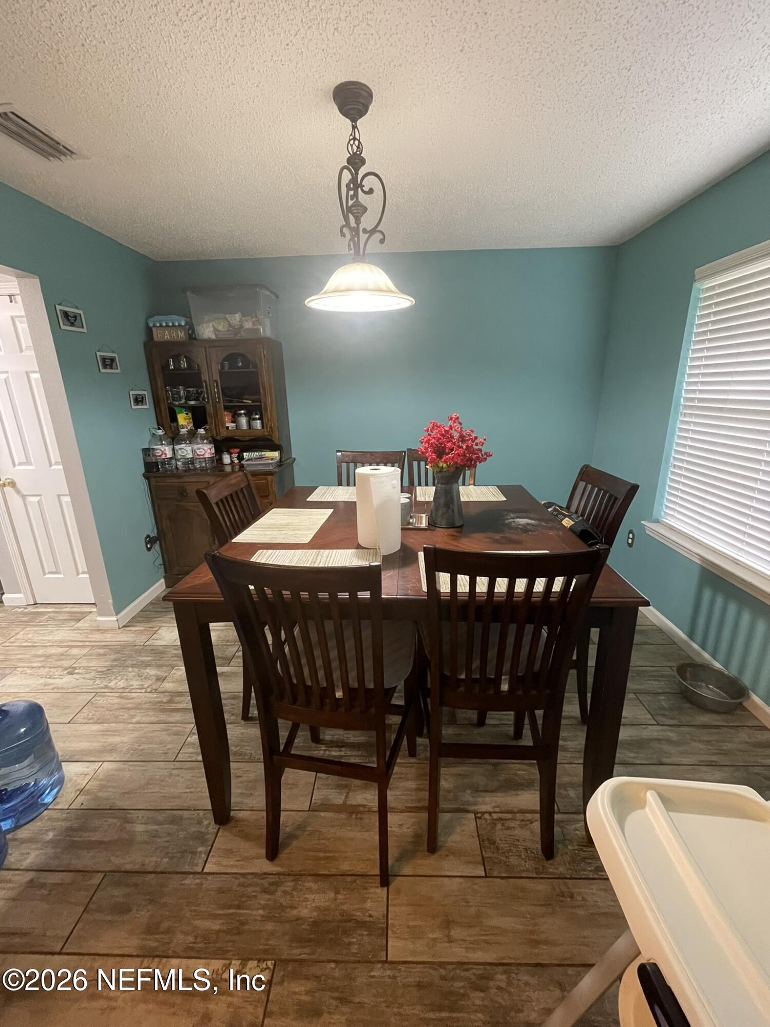 2946 Longleaf Ranch Circle Middleburg, FL 32068 - Photo 6 of 18 a view of a dining room with furniture