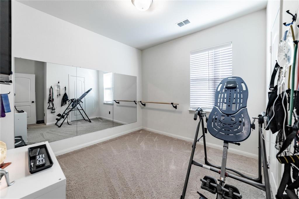 3021 Earl Road Anna, TX 75409 - Photo 16 of 20 a view of gym equipment with a window