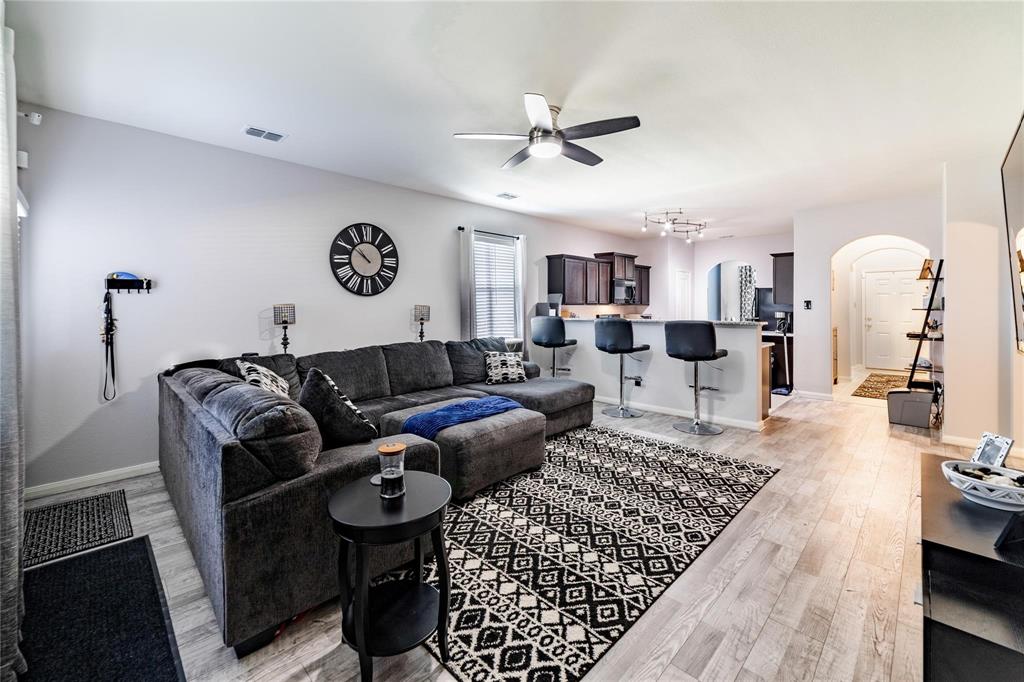 3021 Earl Road Anna, TX 75409 - Photo 3 of 20 a living room with furniture and a table