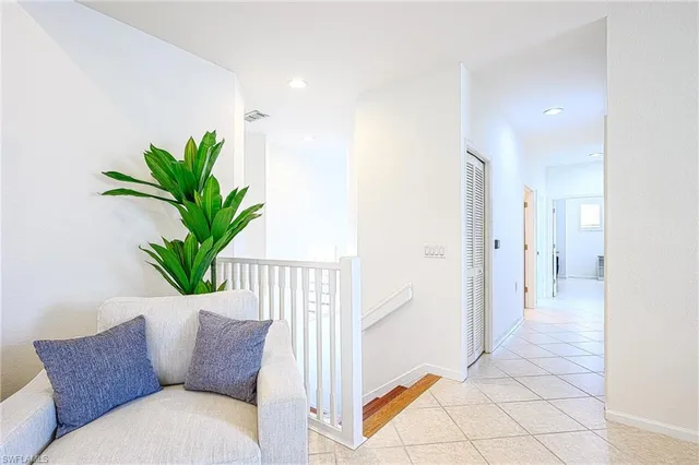 a kitchen with stainless steel appliances a stove refrigerator sink and cabinets