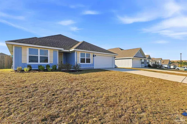 a house view with a swimming pool