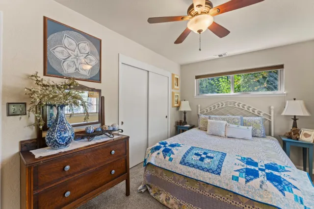 a bathroom with a sink vanity and mirror