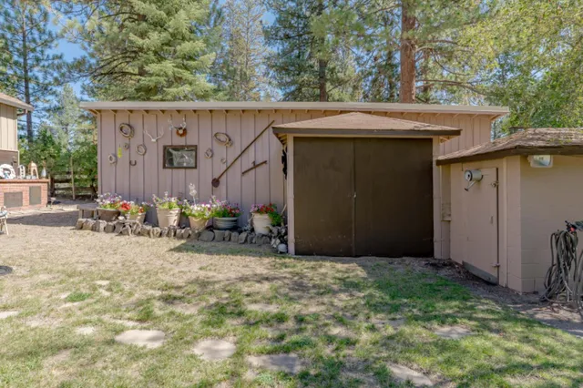 an aerial view of residential house with outdoor space