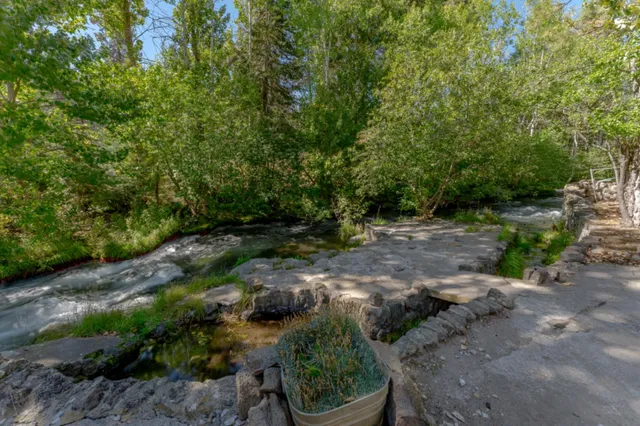 an aerial view of house with yard