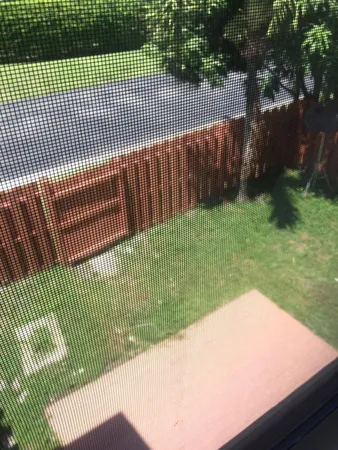 a view of a tennis net on a tennis court