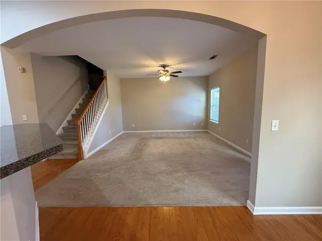 a view of a livingroom with a staircase