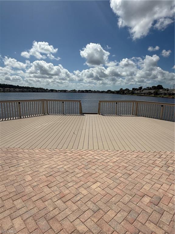 1715 Reuven Circle, Unit 2103 Naples, FL 34112 - Photo 27 of 38 View of patio with a water view