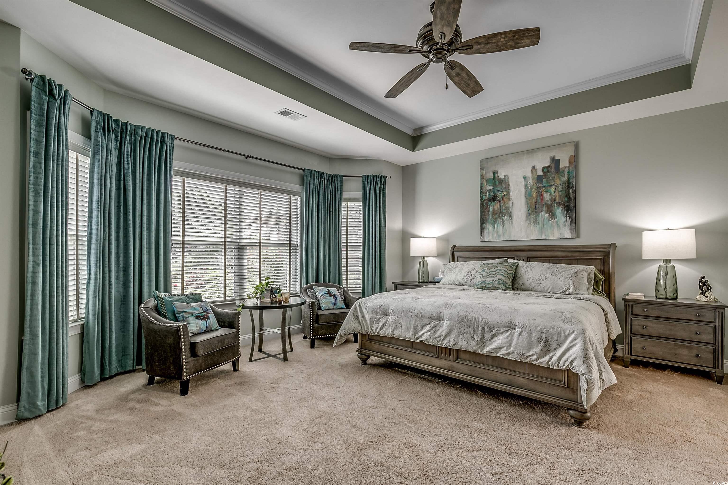 925 Abernathy Place Surfside Beach, SC 29575 - Photo 11 of 40 Carpeted bedroom featuring ornamental molding, a r