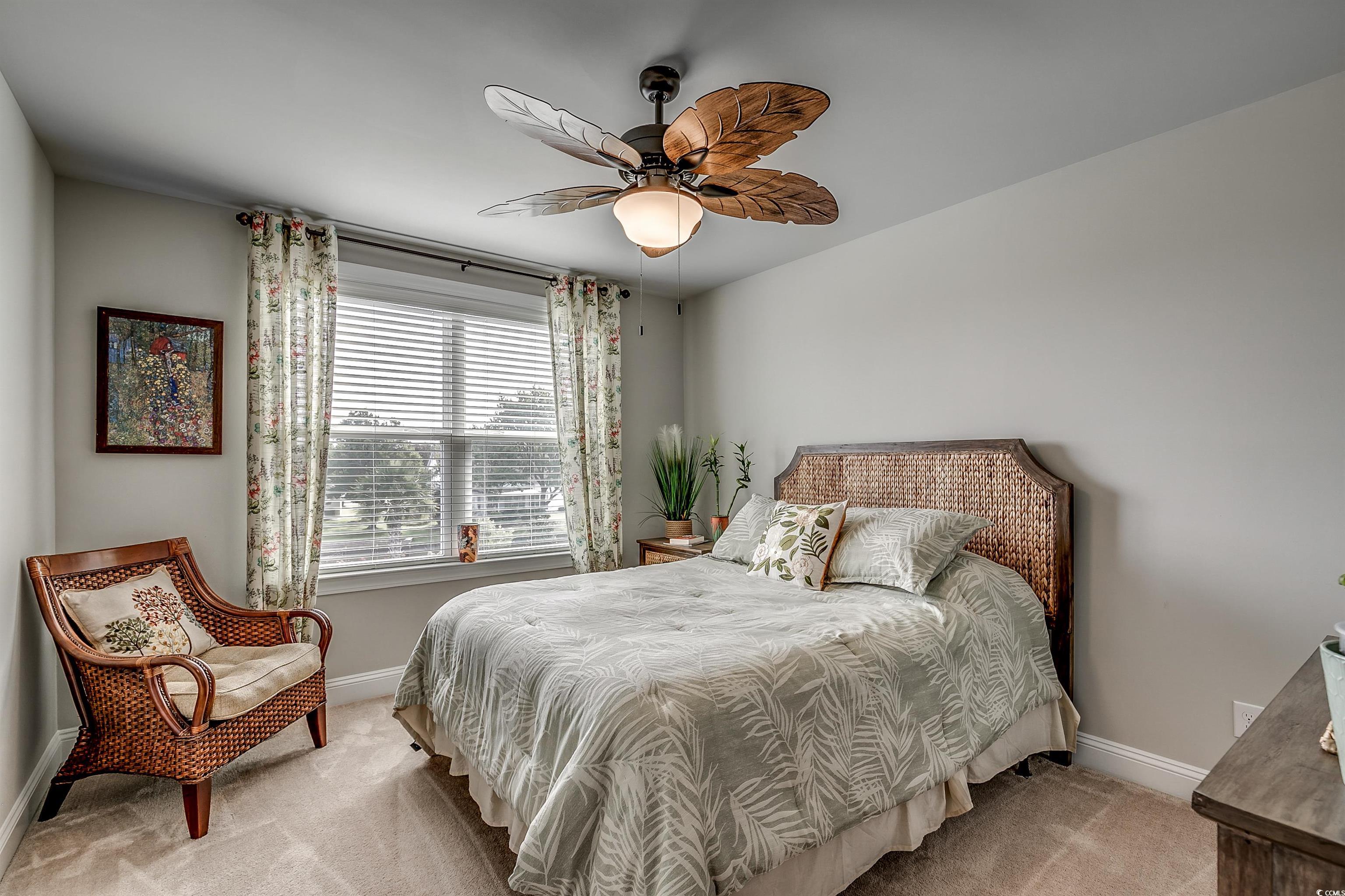 925 Abernathy Place Surfside Beach, SC 29575 - Photo 21 of 40 Bedroom featuring baseboards, carpet floors, and c
