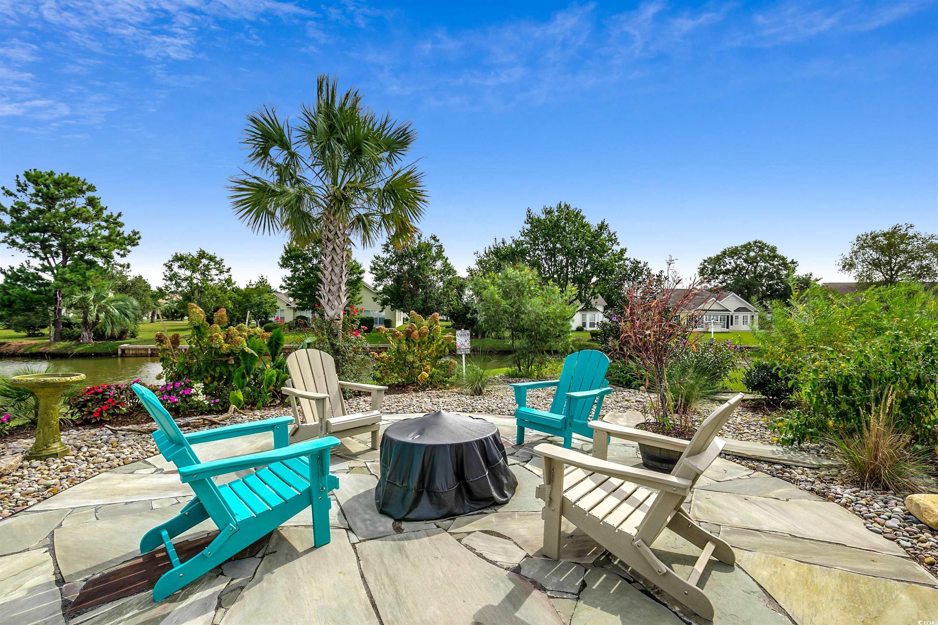 925 Abernathy Place Surfside Beach, SC 29575 - Photo 27 of 40 View of patio / terrace featuring a water view and