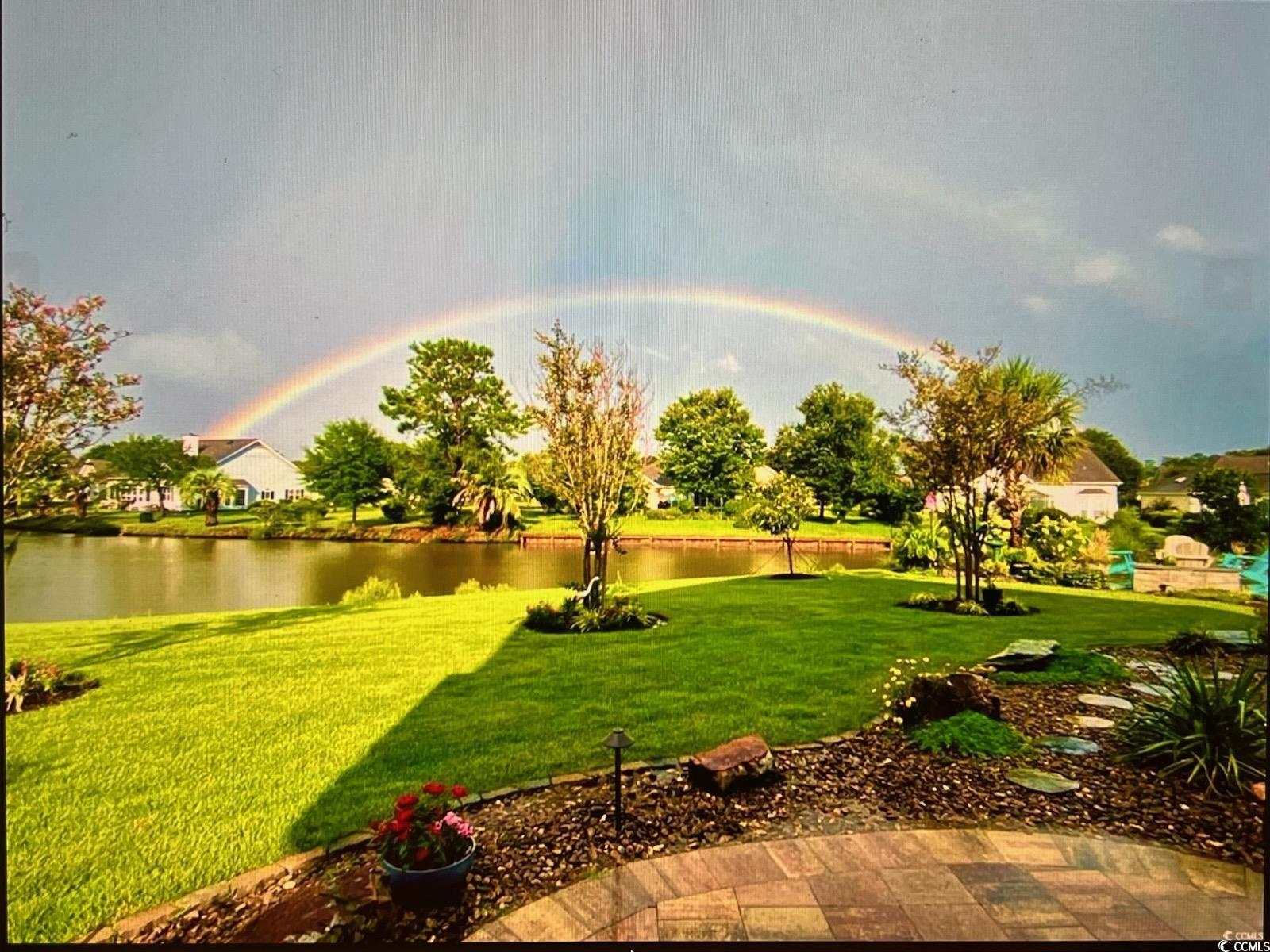 925 Abernathy Place Surfside Beach, SC 29575 - Photo 35 of 40 View of grassy yard with a water view