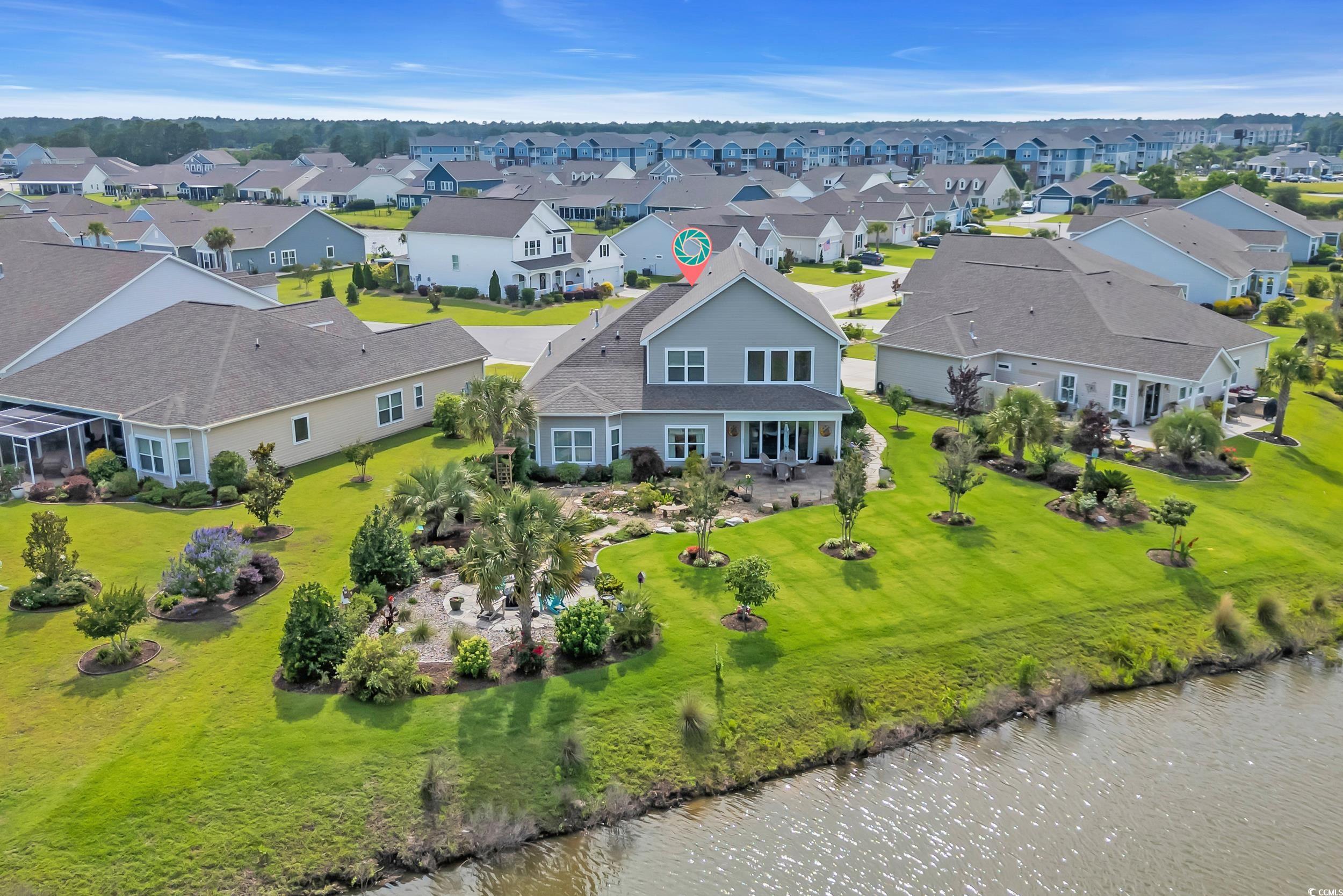 925 Abernathy Place Surfside Beach, SC 29575 - Photo 38 of 40 Aerial perspective of suburban area featuring a ne
