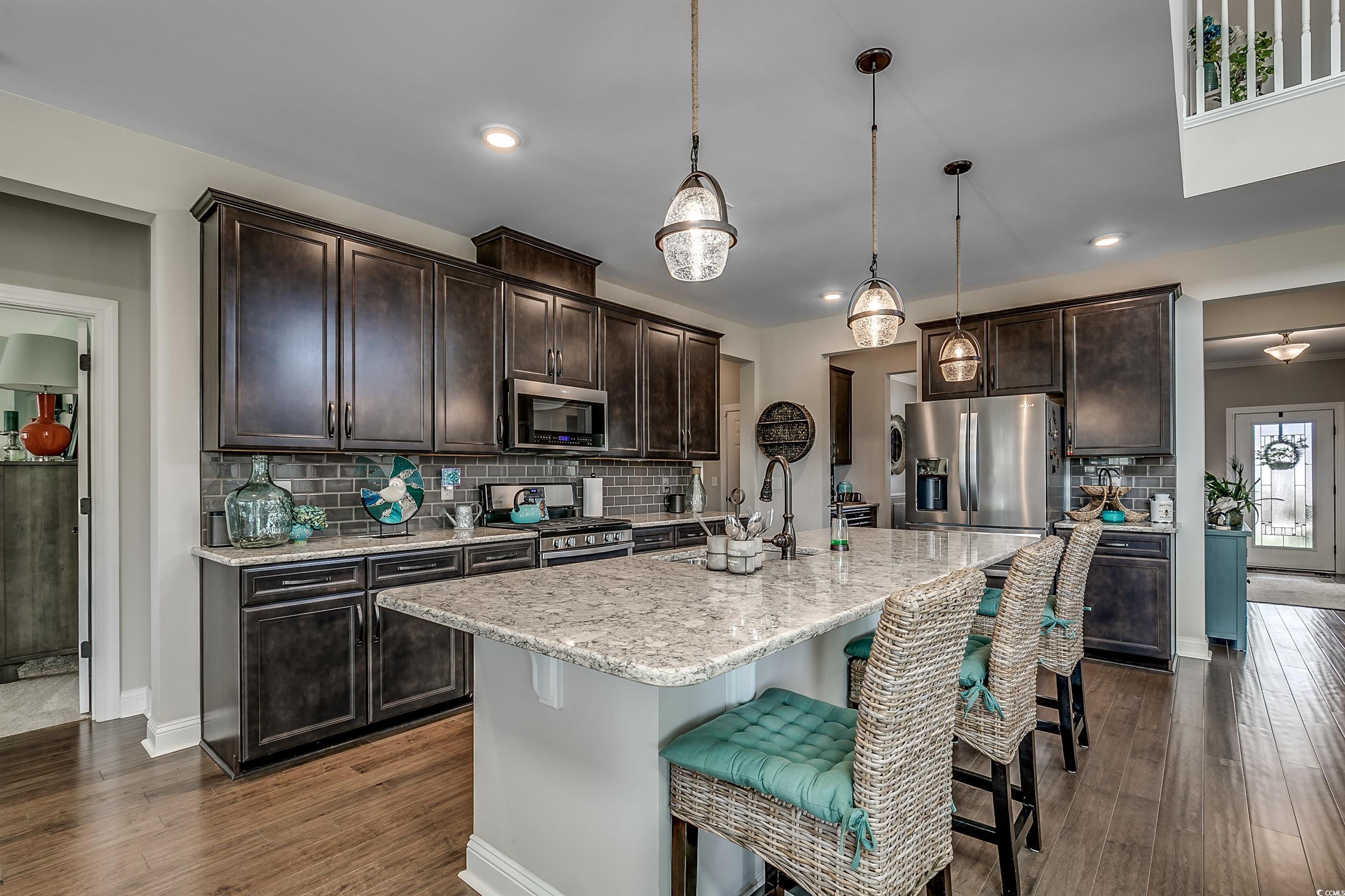 925 Abernathy Place Surfside Beach, SC 29575 - Photo 7 of 40 Kitchen featuring appliances with stainless steel