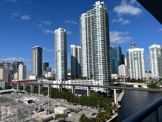 185 Southwest 7th Street, Unit 1403 Miami, FL 33130 - Photo 17 of 31 a view of a large building with a outdoor space