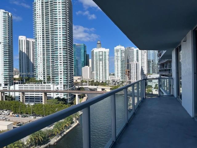 185 Southwest 7th Street, Unit 1403 Miami, FL 33130 - Photo 18 of 31 a view of a balcony and a large window