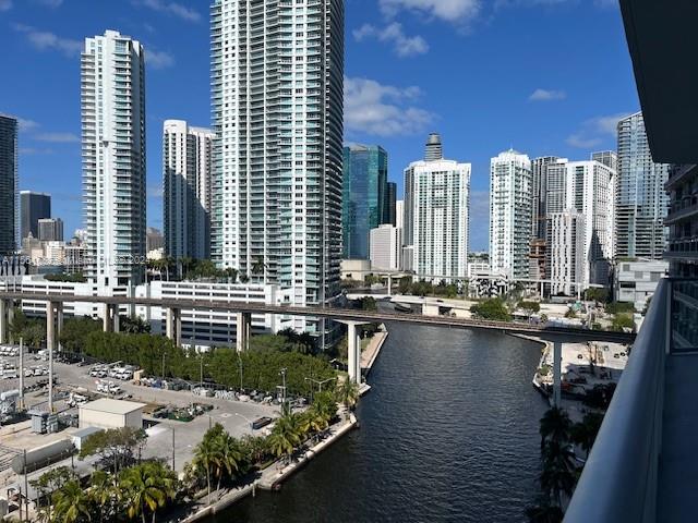 185 Southwest 7th Street, Unit 1403 Miami, FL 33130 - Photo 19 of 31 a view of swimming pool with outdoor seating