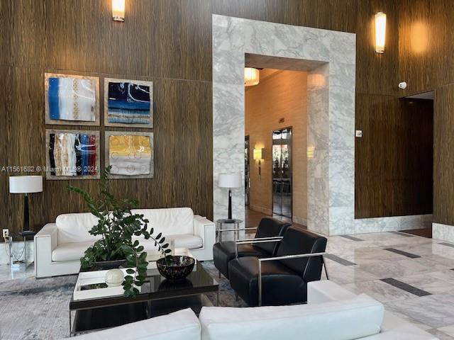 185 Southwest 7th Street, Unit 1403 Miami, FL 33130 - Photo 21 of 31 a living room with furniture