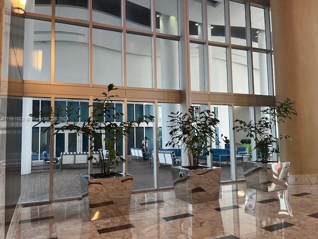185 Southwest 7th Street, Unit 1403 Miami, FL 33130 - Photo 22 of 31 a view of a building with sitting area