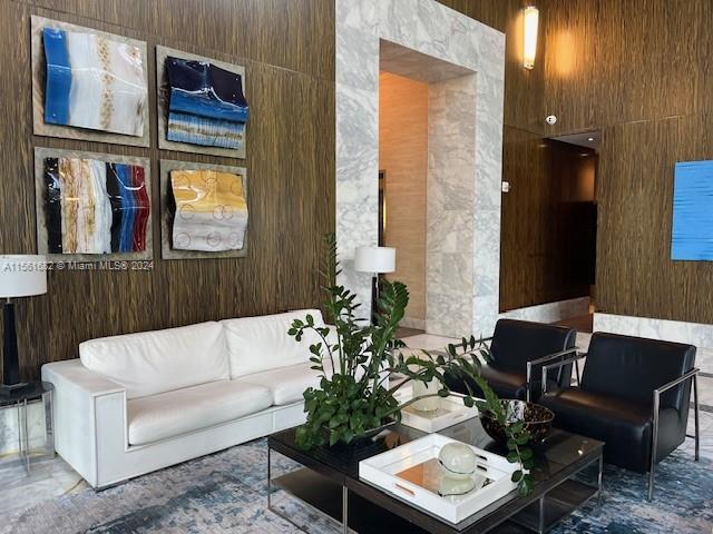 185 Southwest 7th Street, Unit 1403 Miami, FL 33130 - Photo 24 of 31 a living room with furniture and a window