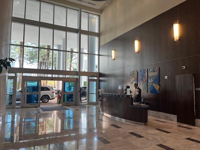 185 Southwest 7th Street, Unit 1403 Miami, FL 33130 - Photo 26 of 31 a view of a living room and dining room