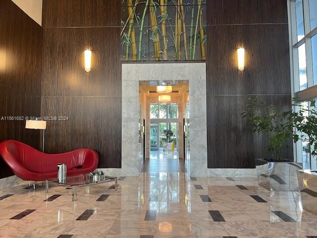 185 Southwest 7th Street, Unit 1403 Miami, FL 33130 - Photo 30 of 31 a view of a door and chair in the patio