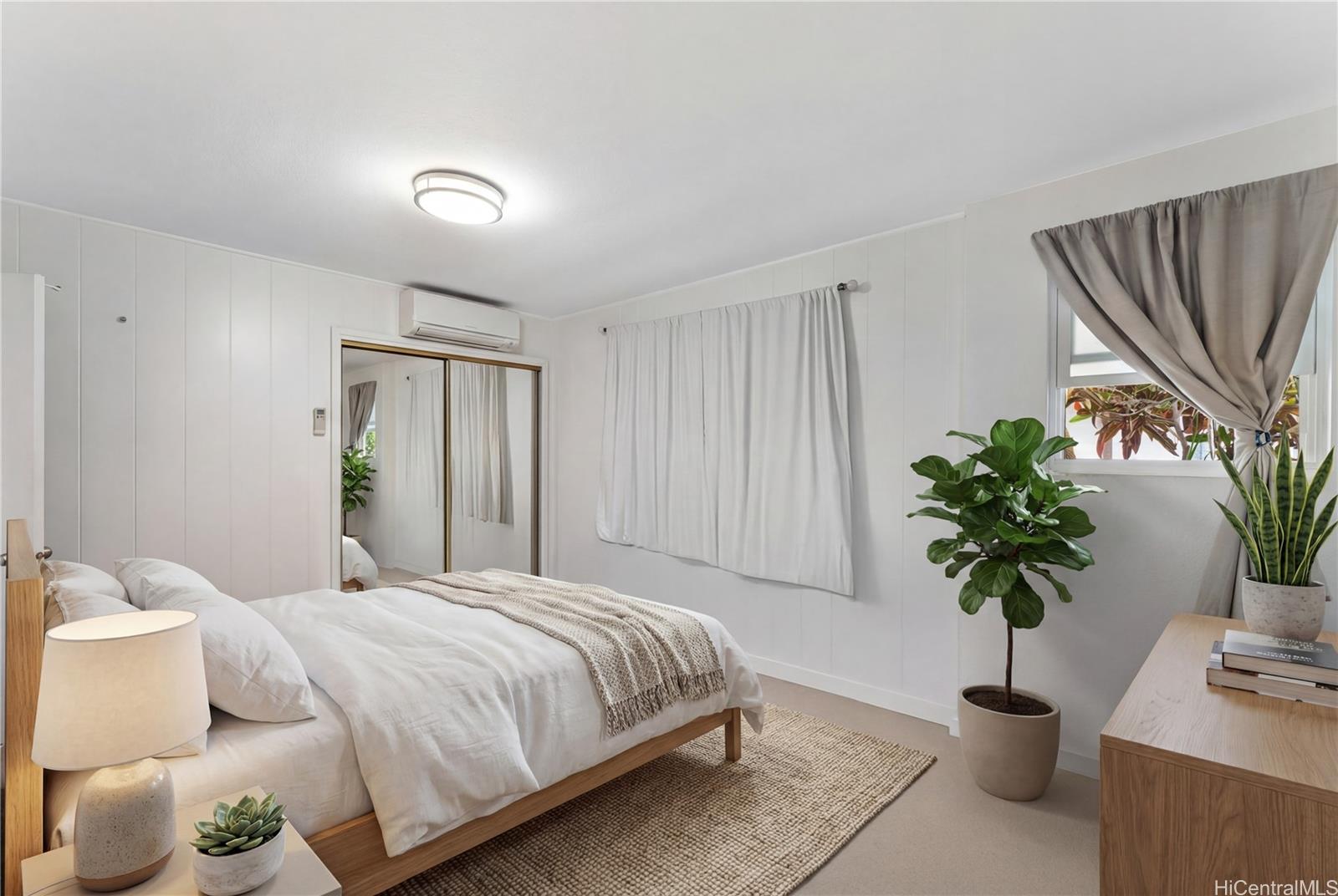 1837 Pacific Heights Road Honolulu, HI 96813 - Photo 11 of 17 Primary bedroom with on suite bathroom and split AC